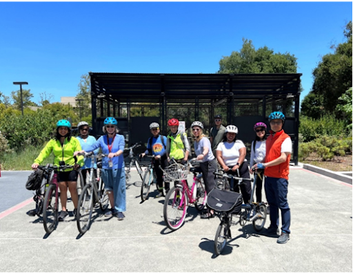 Riders on the Stanford Campus bike tour group stopped at the Center for Academic Medicine bike cage. 