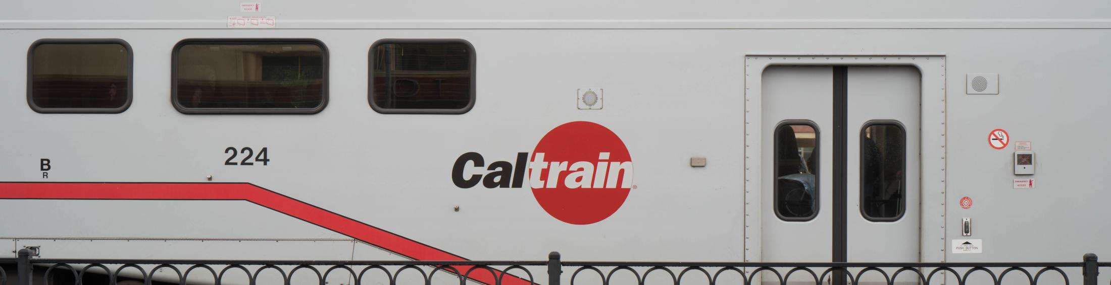 Caltrain car stopped at a station