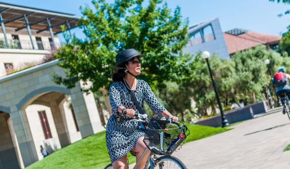 woman dressed for work on bike