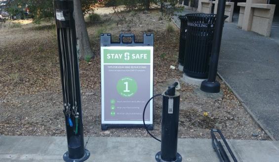 Stay Safe bike repair stand signage at Stock Farm Garage
