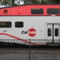 Caltrain car stopped at a station